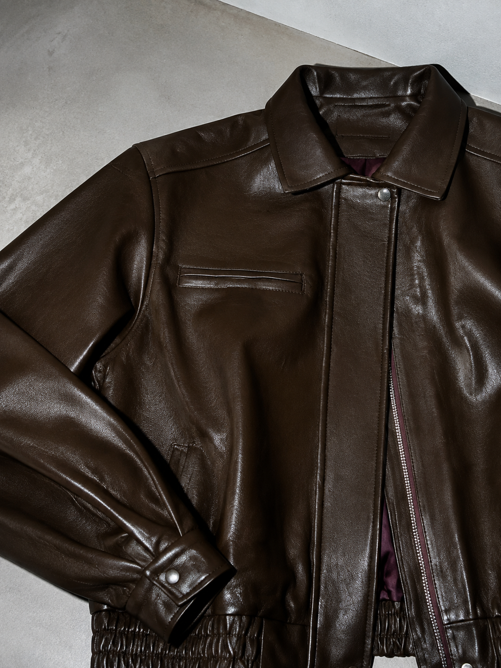 Code Culture catalog | brown-brown-autumn-trendy-leather-jacket | color-brown | macro flat lay