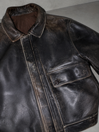 Women's Oversized Distressed Dark Brown Leather Jacket — Macro Fabric Texture Detail